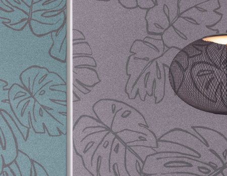Grüne und graue Akustikstoffe mit Blattmotiv. Foto:TROPEA 07 Photo: Creation Baumann